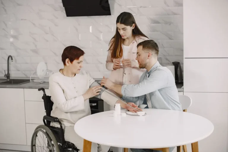 A family monitors blood pressure at home, ensuring health and wellness.